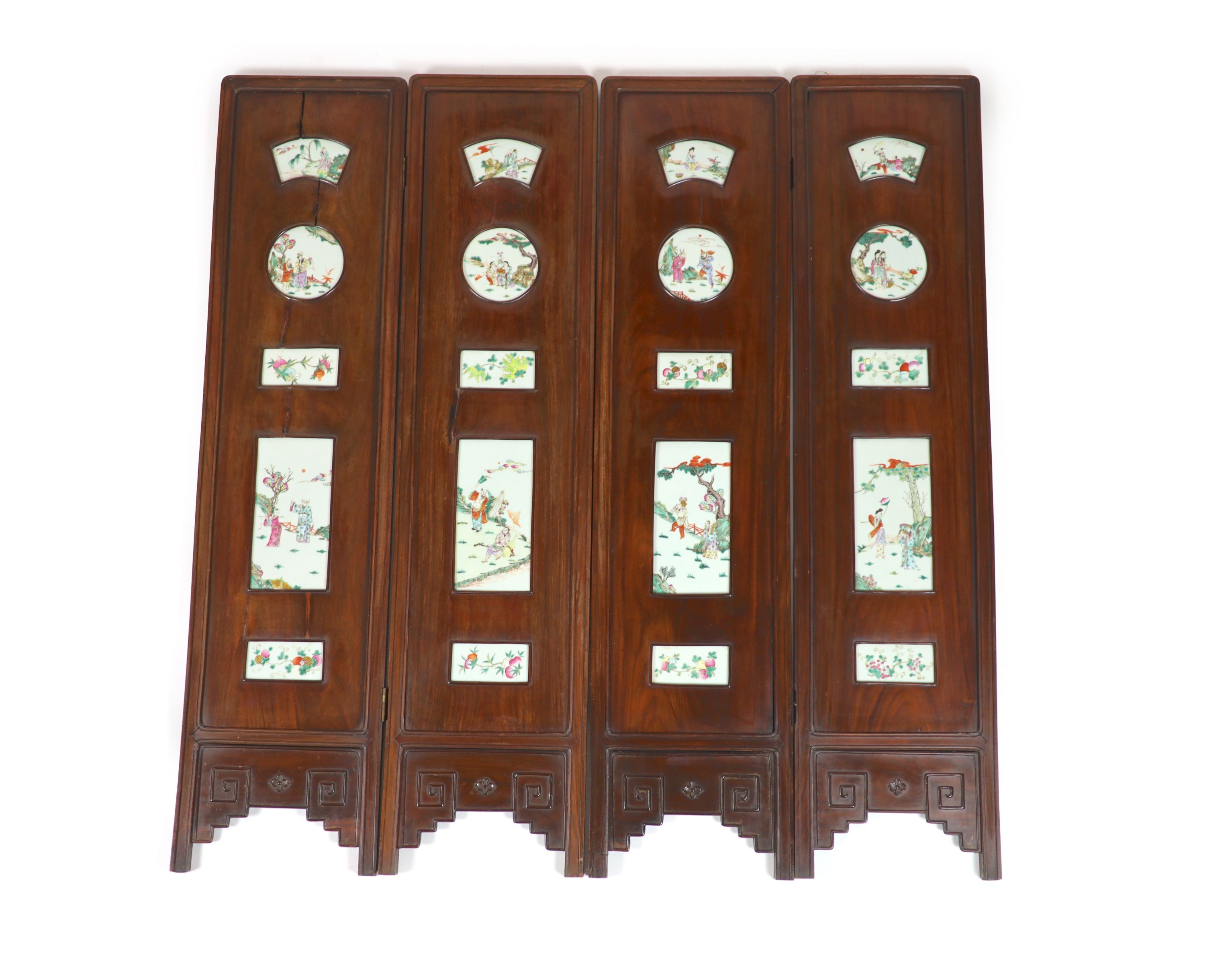 A Chinese porcelain mounted hardwood four fold screen, mid 19th century, Total size 127cm high x 122cm wide